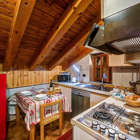 Maison Sapin Курмайор